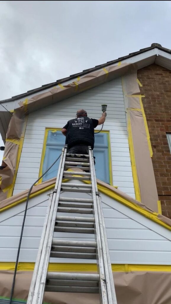 alt="uVPC cladding being sprayed"